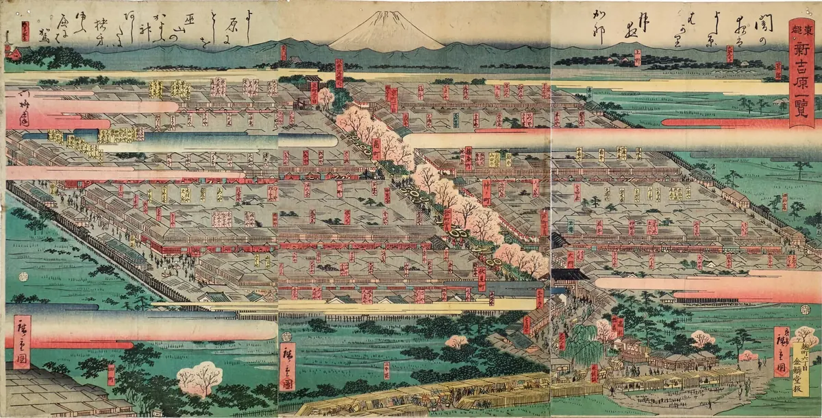 A colour woodblock print of Yoshiwara seen from above, a rectangular walled district of rooftops with cherry trees and Mount Fuji far behind